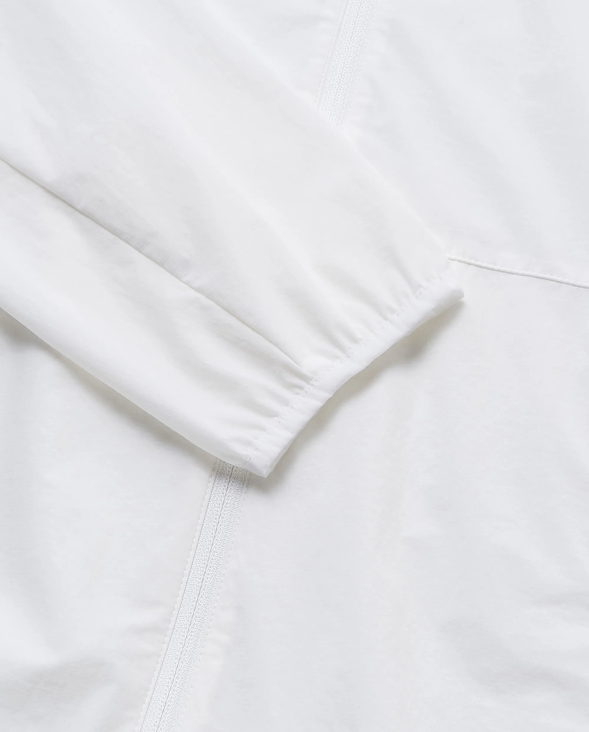 1910052-101 | WOMEN'S K-SWISS LOGO STAND COLLAR HOODED JACKET | WHITE/WHITE