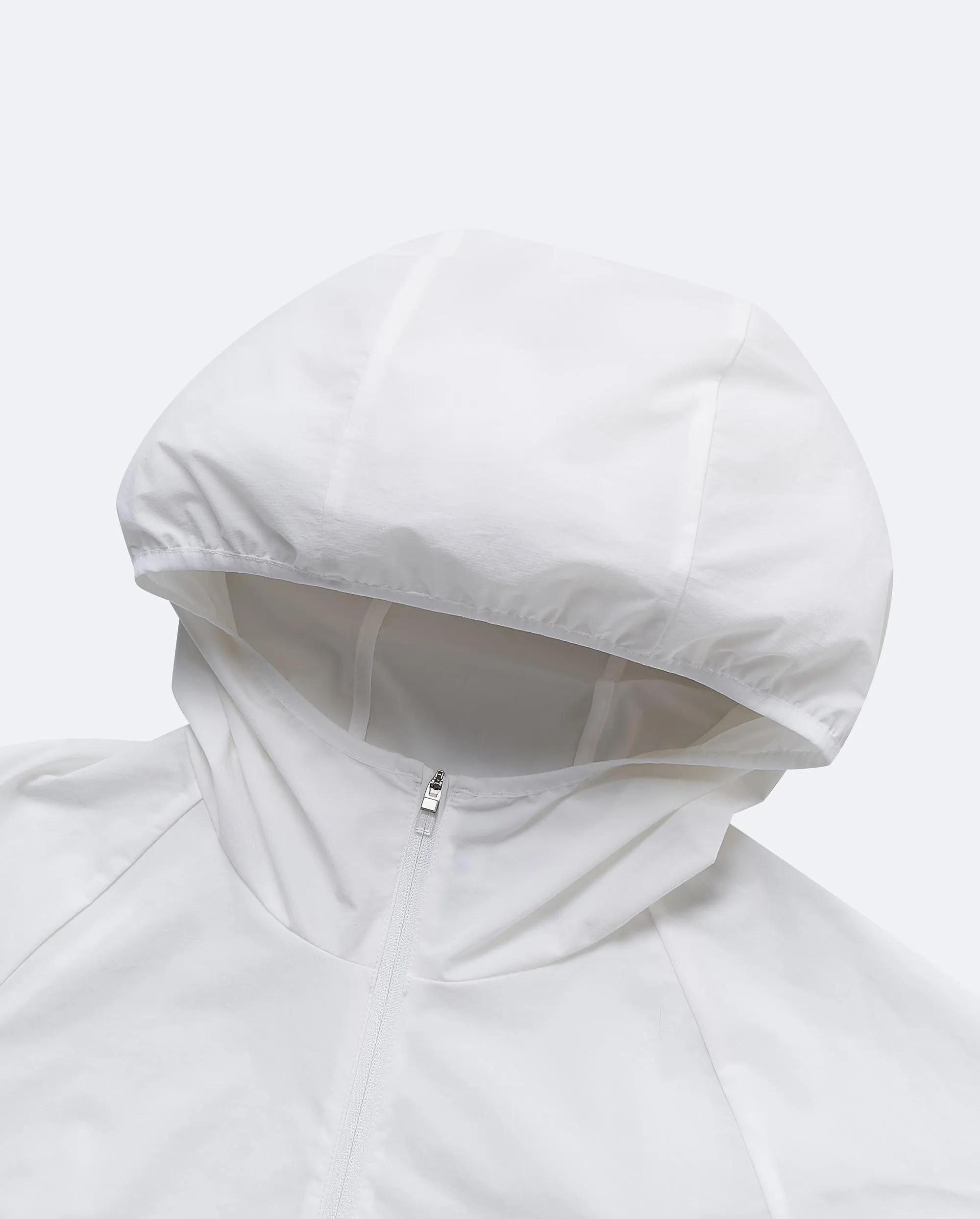 1910052-101 | WOMEN'S K-SWISS LOGO STAND COLLAR HOODED JACKET | WHITE/WHITE