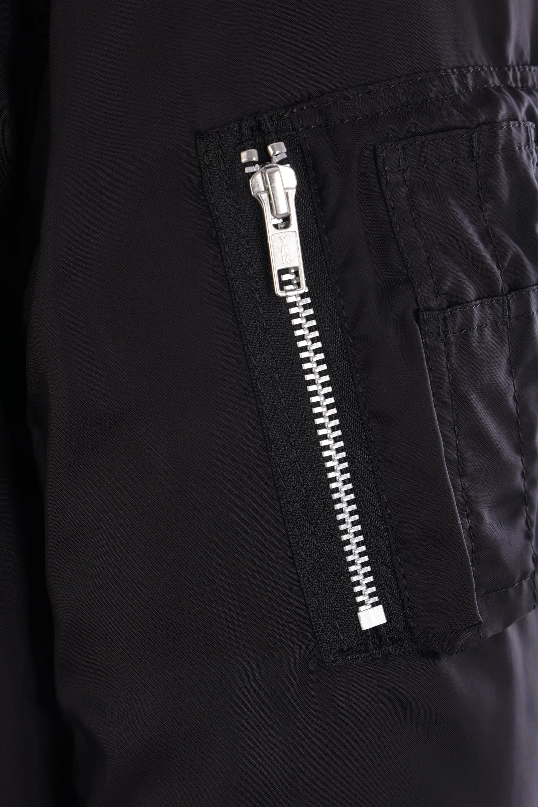 reversible asymmetrical bomber jacket.